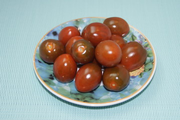   cherry tomatoes on a plate