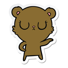 Fototapeta premium sticker of a peaceful cartoon bear