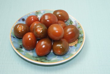   cherry tomatoes on a plate