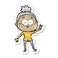 distressed sticker of a cartoon happy old woman