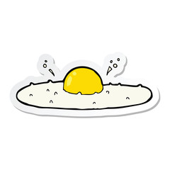 sticker of a cartoon fried egg