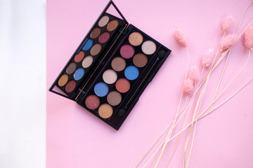 Palette of multicolor cosmetic make up, eye shadow palette, colorful shadows texture