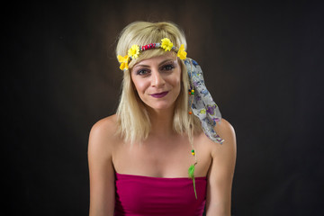 portrait of beautiful young woman wearing hippie headband