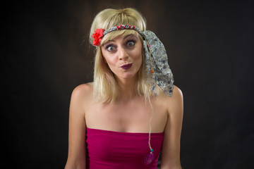 portrait of beautiful young woman wearing hippie headband