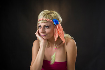 portrait of beautiful young woman wearing hippie headband