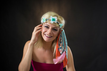 portrait of beautiful young woman wearing hippie headband