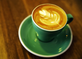 Coffee cup on wooden table