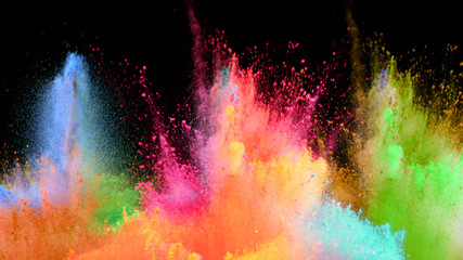 Multi-color powder explosion on black background