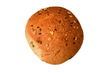 Whole grain bun with black sesame and sunflower seeds on a white background. Isolated