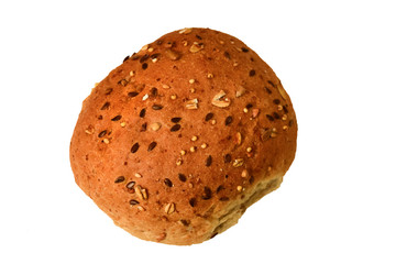 Whole grain bun with black sesame and sunflower seeds on a white background. Isolated