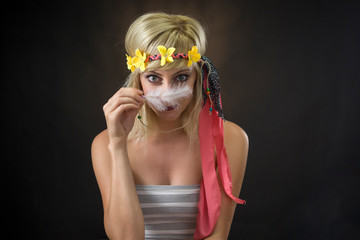 portrait of beautiful young woman wearing hippie headband