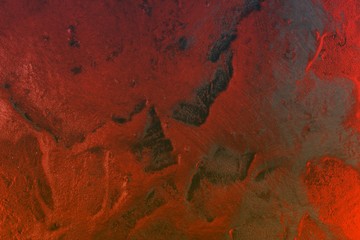 red aged shining raised cement texture - cute abstract photo background