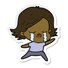 sticker of a cartoon girl crying
