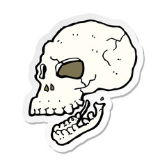 sticker of a cartoon spooky skull