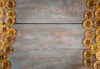 bitcoins in wooden background
