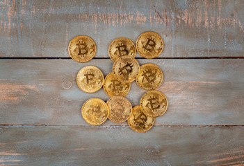 Obraz na płótnie Canvas bitcoins in wooden background