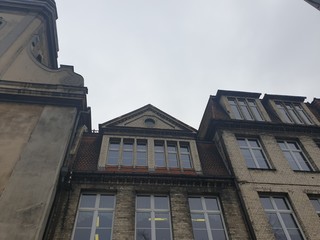 Stone brick house in the city center, photo at an angle, the old town
