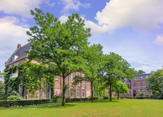 Renovated brick monastery in a lush green environment, Tilburg, Netherlands