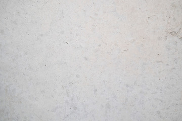 Wall fragment with scratches and cracks