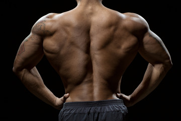Perfect physique. Cropped shot of a muscular back of a toned male model