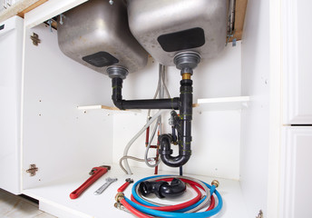 Plumber tools, kitchen sink