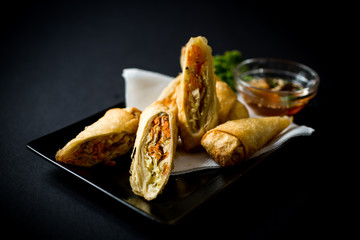 Thai food. Spring rolls with vegetables and sweet and sour sauce