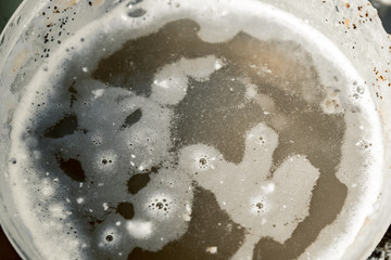 dirty dishes, cups, plates, spoons in the sink