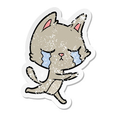 distressed sticker of a crying cartoon cat running