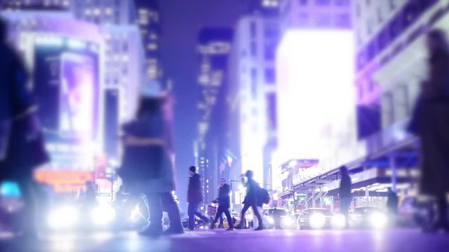 Pedestrians Commuters Walking on Urban Street in the City at Night