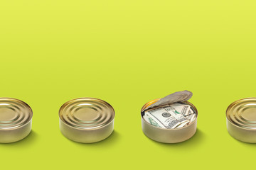 Money tin cans line with open one