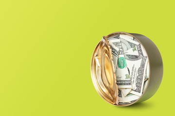 Open tin can with dollar bills background