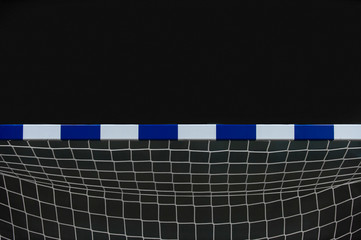 Gate for futsal or handball in gym. Detail of gate frame and net. Outdoor football or handball playground