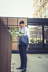 Young businessman reading his notebook