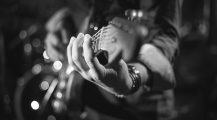 playing guitar in b/w
