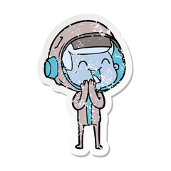 distressed sticker of a happy cartoon astronaut
