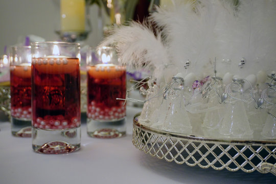 Engagement catering concept with ornaments candles cake and chocolate