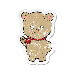 retro distressed sticker of a cartoon waving teddy bear