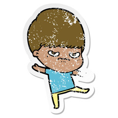 distressed sticker of a annoyed cartoon boy