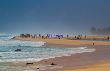 The Crowd at Banzai Pipeline beach watching surfers