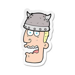 sticker of a cartoon screaming warrior man