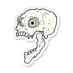 sticker of a cartoon scary skull