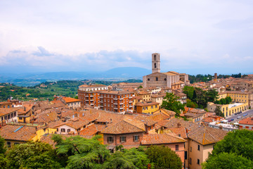 Naklejka premium Perugia, Umbria / Italy - 2018/05/28: Panoramic view of Perugia and Umbria region mountains and hills with St. Domenico Basilica - Basilica di San Domenico