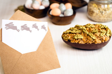 envelope with space for text, background image for photo editing. Envelope on table in kitchen.