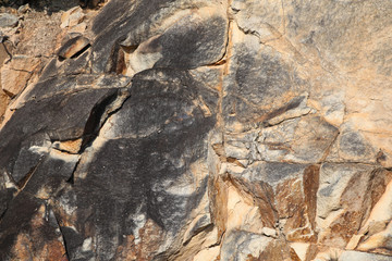 Huge natural stone with hard surface close-up texture