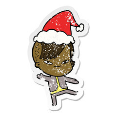 cute distressed sticker cartoon of a girl with hipster haircut wearing santa hat