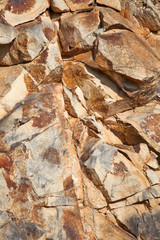 Huge natural stone with hard surface vertical texture