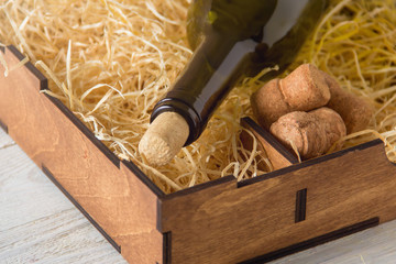 wine bottle in wooden box with copy space,