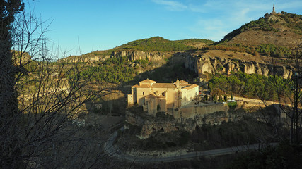 Fototapeta na wymiar Panorama of the Uclés Monastery of the old town of Cuenca at night. Tour of tourism. Famous Hanging Houses.