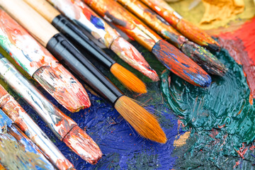 Fototapeta premium Paint brushes and paints for drawing.