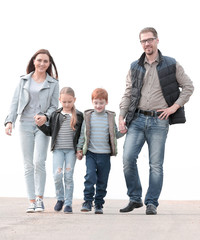 parents and their children walking together